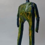 Bemalte Pappmaché-Figur, stehend, roter Kopf, grün-blau-gelber Körper | Painted papier-mâché figure standing, red head, green-blue-yellow body
