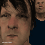 Zwei 3D-gerenderte männliche Gesichter mit braunem Haar, realistischer Textur | Two 3D-rendered male faces with brown hair and realistic skin texture